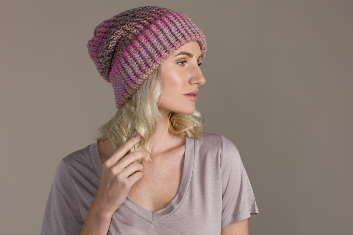 Louise Curran Knits Product Photography Model wearing hat in studio
